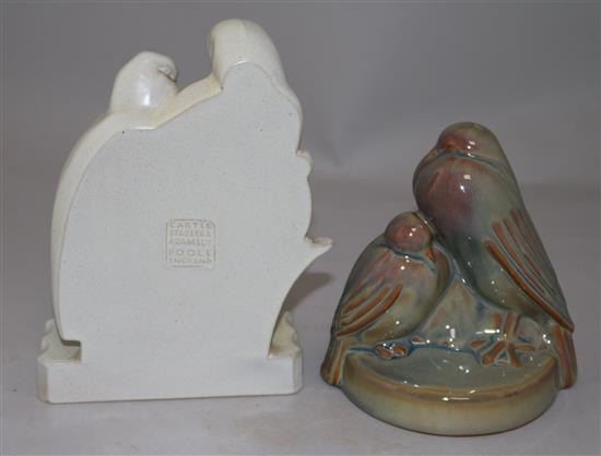 A pair of Poole Pottery Lovebirds bookends and another similar bookend, largest 7.75in.